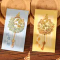 Exquisite hollow metal bookmarks featuring floral patterns and Chinese calligraphy designs - Prosperous Future + Everything Goes Well (W891)