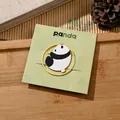 A cute metal panda bookmark featuring a round gold frame on a green bamboo card - Bamboo Baby / Round Style