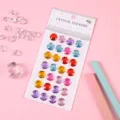 Colorful round crystal gem stickers for DIY crafts shown on a soft pink background - 1 Piece / Multicolor Round