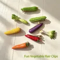 Detailed view of realistic vegetable-shaped hair clips including chili, carrot, and eggplant shapes - Bitter Gourd