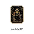 Close-up of a black and gold Tarot-themed metal pin featuring a skeleton on a throne - Throne and Crown