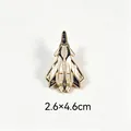 Macro view of fighter jet enamel pin showing 2.6x4.6cm dimensions - Baidi Aerospace Fighter