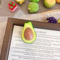 Close-up of cute 3D resin avocado fruit brooch showing size: 2.3cm x 3.4cm - Large Avocado Green