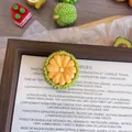 Detailed macro view of a cute resin passion fruit brooch with 2.3cm by 2.9cm dimensions - Jackfruit
