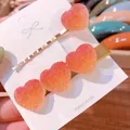 Cute gradient pink gummy heart hair clip set featuring a frosted sugar-like texture - Heart Set (Headband & Comb) / Orange Gradient