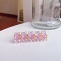 Adorable iridescent transparent pink gummy bear hair clip with candy color finish - Light Pink
