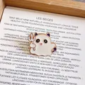 Close-up of a cute ghost enamel pin with cat ears and pitchfork for Halloween. - Ghost