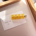 Cute yellow transparent gummy bear hair clip featuring a glossy candy-colored resin finish - Solid Orange