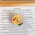 Detailed macro shot of an enamel Mid-Autumn Festival mooncake pin badge with lotus - Mooncake Festival Badge (YJ009)