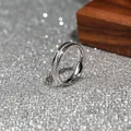 Macro view of a minimalist silver titanium steel ring featuring a frosted sandblasted finish - Size 5 / Silver