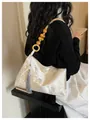 Elegant New Chinese style shoulder bag featuring floral embroidery and a wood bead strap. - Off White