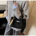Professional black suede handbag featuring decorative beads and crossbody strap - With Pendant / Black