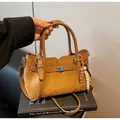 Vintage brown suede tote bag with decorative beaded charm and crossbody strap - With Pendant / Yellow Brown