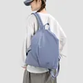 Casual light blue nylon backpack for women with minimalist design and adjustable straps - Blue