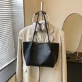 Large minimalist black PU leather tote bag designed for commuter use and summer fashion - Black