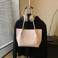 Elegant large capacity commuter tote bag for women in pinkish-beige textured vegan leather - Pink