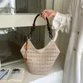 Chic beige hollow-out laser-cut tote bag with wooden bead handle and stylish tassel detail - Tote Bag Style With Ornament (YL1205) / Khaki