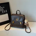 Vintage brown soft leather backpack for women with cute bear pendant and gold buckle - With Pendant / Coffee