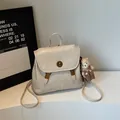 Elegant cream minimalist soft leather backpack with cute teddy bear charm for women - With Pendant / Off White