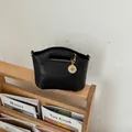 Classic black minimalist handbag for women featuring a stylish golden round charm detail - No Pendant / Black