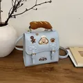 Linda mochila azul claro de dibujos animados con asa de pan y parches bordados para niña - Azul