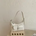 Elegant minimalist cream white shoulder armpit bag with front pocket and buckle detail - 22*10*14cm / White