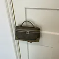 Stylish dark green textured mini handbag for commuting and versatile daily fashion wear - Green