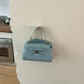 Elegante lichtblauwe handtas met steenpatroon, chique strik en bovenste handgreep - Blauw