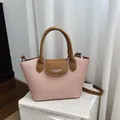 Retro handtas van roze canvas en bruin leer met verstelbare schouderriem voor dames - Regular Fit / Roze