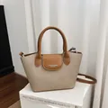 Elegant vintage canvas tote bag with brown leather handles and flap detail. - Regular Fit / Khaki