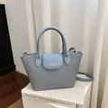 Elegant vintage light blue canvas and faux leather handbag for women, crossbody style - Regular Fit / Blue