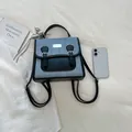 Mochila elegante de denim azul y cuero negro para mujer, ideal para la universidad y diario. - Sin Colgante / Negro
