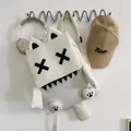 Cute white quirky cartoon monster school backpack with X shaped eyes fashion variant - White Without Pendant