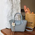 Elegant blue vintage handbag for women with flower charm and adjustable shoulder strap - With Flower Pendant / Blue