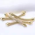 Close-up of 18K gold plated zircon curved tube connectors for DIY jewelry creation - 18K Gold Plated
