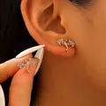 Elegant gold-tone mini dragon stud earrings with sparkling rhinestones for women's jewelry - KC Gold Inlaid Rhinestone Flying Dragon Stud Earrings (1363)