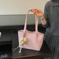 Stylish pink textured tote bag with cute teddy bear charm for elegant commuter look - Pink (with Pendant)