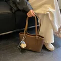 Brown textured leather tote bag with adjustable shoulder straps and bear charm - Coffee (With Pendant)