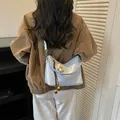 Trendy light blue polka dot bucket bag for women with floral charm and beaded strap - Blue With Pendant