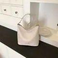 Elegante crèmekleurige geweven schoudertas met grote capaciteit voor actieve dames - Groot (33x13x29cm) / Beige