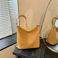Stylish mustard yellow woven tote bag with a large capacity and adjustable strap - Small (27x11x24.5cm) / Yellow