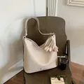 Chic cream woven shoulder bag with large capacity and floral charm for elegant daily use - With Flower Pendant / Large (33x13x29cm) / Beige