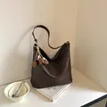 Large capacity coffee brown woven hobo shoulder bag for women elegant daily commute - With Flower Pendant / Small (27x11x24.5cm) / Coffee