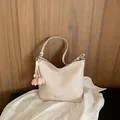Minimalist beige woven shoulder tote bag with elegant floral charm for stylish women - With Flower Pendant / Small (27x11x24.5cm) / Beige