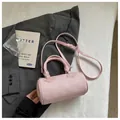 Chic pink barrel handbag for women with woven texture and adjustable shoulder strap - No Pendant / Pink