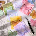 Nahaufnahme von bunten Schmetterlings-Haftnotizen für Journaling und Briefpapier-Dekor - Farbmischung (Zufällig) / 4er-Pack Blöcke