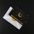 Elegante schwarze Grußkarte mit goldenem Mond-Foliendesign und weißem Umschlag - Stern Mond Liebe