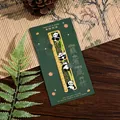 Premium cute panda-themed metal ruler bookmark inside a dark green gift card sleeve - Confident Panda (Bamboo) / Straight Style
