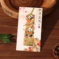Cute panda metal bookmark with intricate maple leaf design presented on decorative cardstock - Maple Splendor / 1 Piece