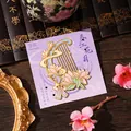 Traditionelles chinesisches Metall-Lesezeichen mit floralem Instrumenten-Hohldesign - Frühlingsfluss und Blumenmond / 1 Stück